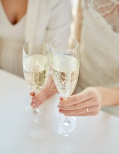 11299533-close-up-of-lesbian-couple-with-champagne-glasses